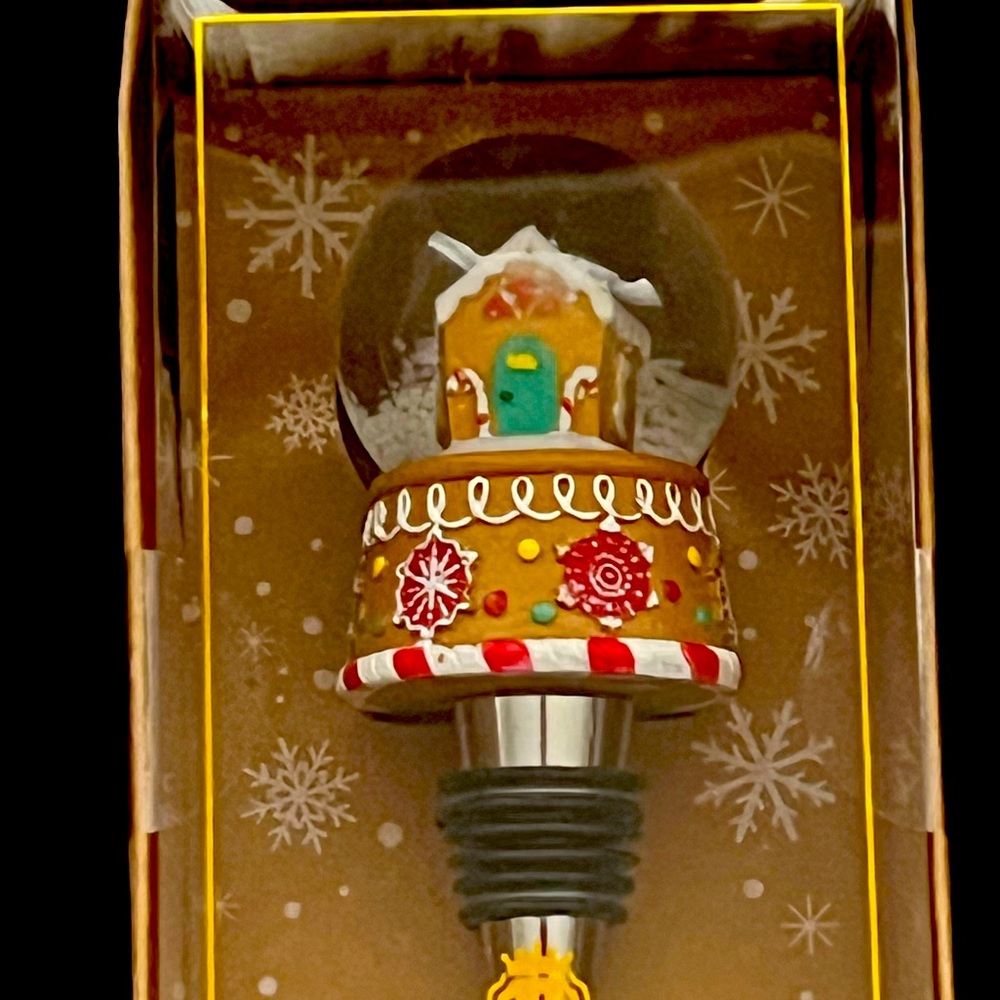 gingerbread house globe wine stopper by wild eye designs. Super cute
